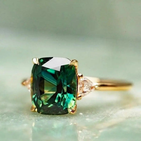 Elegant square ring with emerald