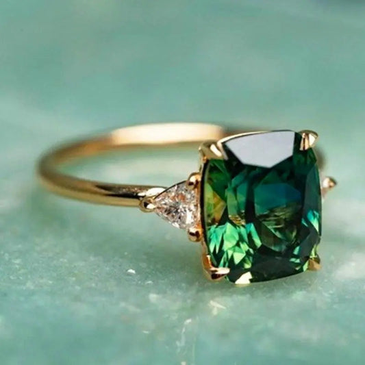 Elegant square ring with emerald