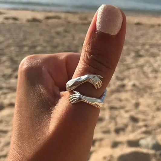 Adjustable silver hug ring