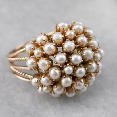 Ring with embedded pearls
