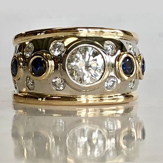 Vintage ring with gold inlay and zirconia