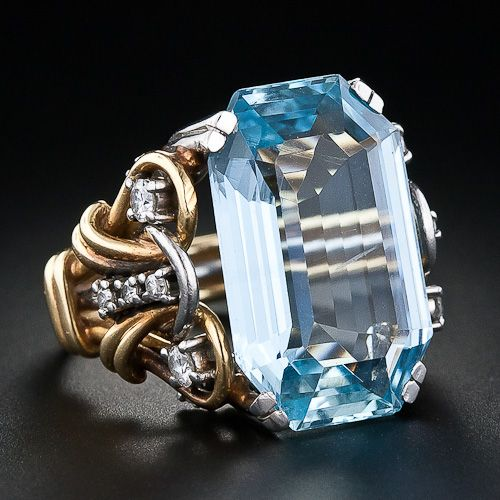 Vintage gold ring with layered design and blue cubic zirconia